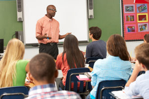 Teacher with students in classroom