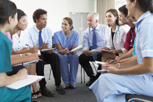 Medical Staff Seated In Circle